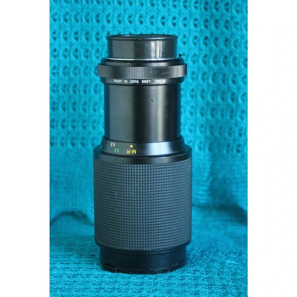 Vivitar 75-205 MM F1:3.8 Lens for Minolta MC mount with 2x converter.